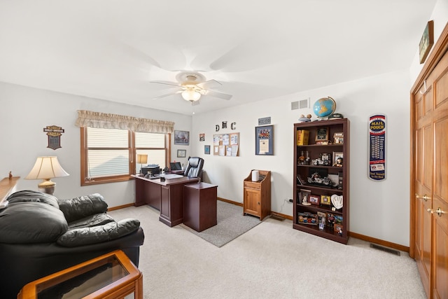 595 Sudbury Cir, Oswego, IL 60543 - home office with ceiling fan, light carpet, and baseboards