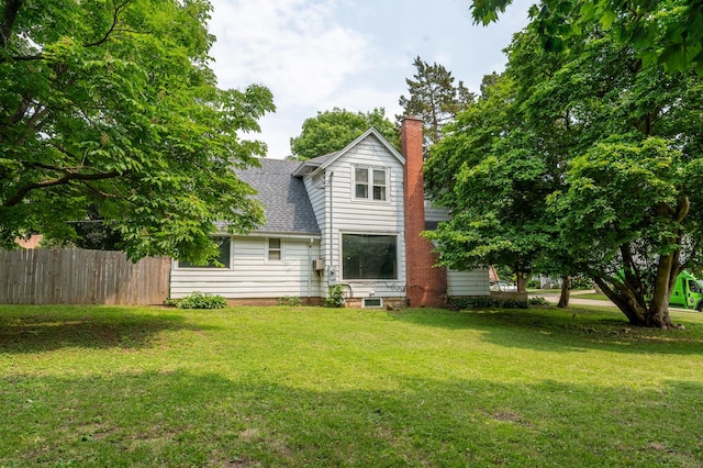 4 E Lincoln St, Mount Morris, IL 61054 - back of house featuring a chimney and a shingled roof