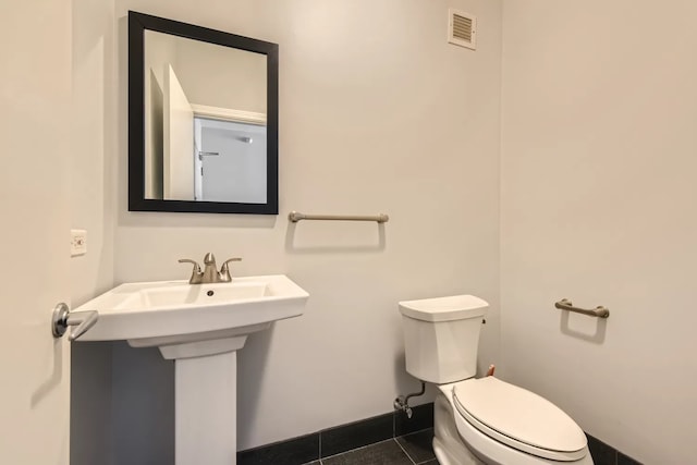645 N Kingsbury St Unit 1203, Chicago, IL 60654 - bathroom featuring toilet and tile patterned floors