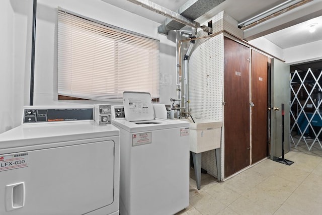 2155 N Harlem Ave Unit 205, Chicago, IL 60707 - laundry room with separate washer and dryer and a sink