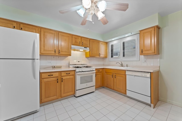 2155 N Harlem Ave Unit 205, Chicago, IL 60707 - kitchen with white appliances, under cabinet range hood, a sink, and light countertops