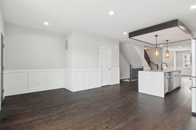 4637 S Michigan Ave, Chicago, IL 60653 - kitchen with open floor plan, dark wood-style floors, light countertops, white cabinets, and recessed lighting
