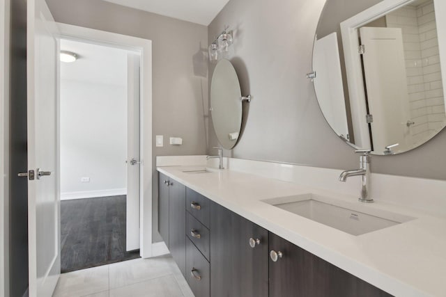 4637 S Michigan Ave, Chicago, IL 60653 - bathroom featuring double vanity and baseboards