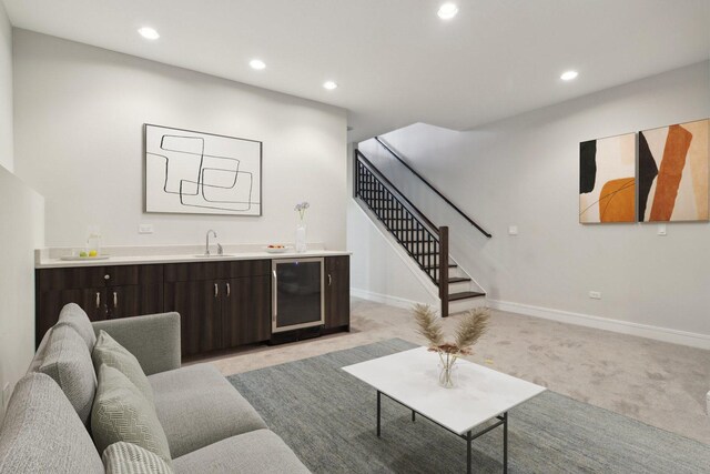 4637 S Michigan Ave, Chicago, IL 60653 - living area with beverage cooler, light colored carpet, recessed lighting, bar with sink, and baseboards