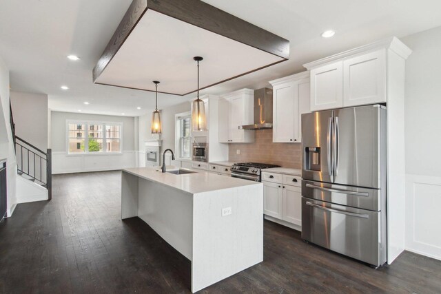 4637 S Michigan Ave, Chicago, IL 60653 - kitchen with stainless steel appliances, a sink, white cabinetry, light countertops, and dark wood-style flooring