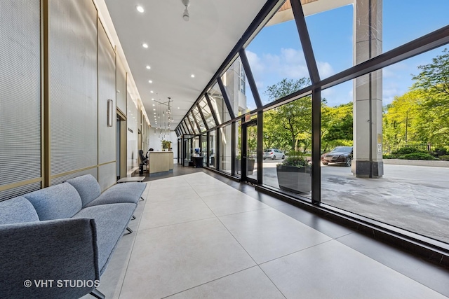 345 W Fullerton Pkwy Unit 1508, Chicago, IL 60614 - lobby featuring recessed lighting, a wall of windows, and a towering ceiling