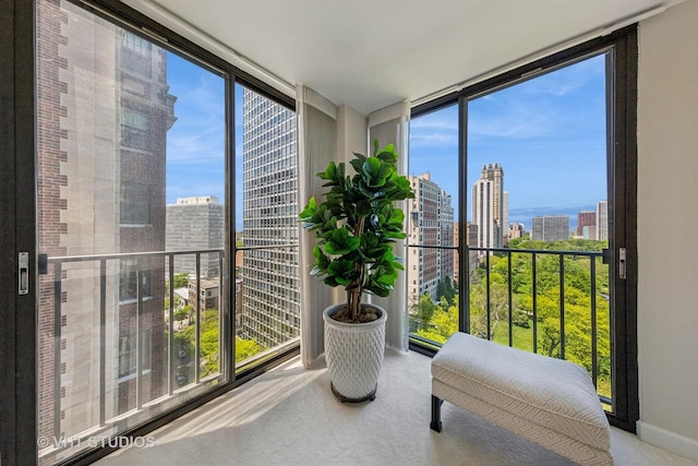 345 W Fullerton Pkwy Unit 1508, Chicago, IL 60614 - sunroom with a view of skyline, floor to ceiling windows, carpet, and baseboards