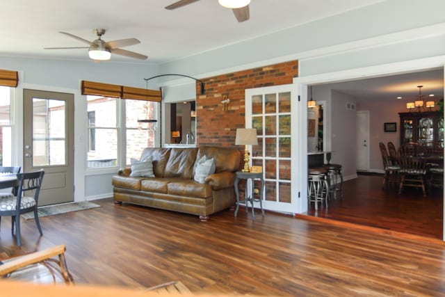 6421 157th St W, Oak Forest, IL 60452 - living area featuring ceiling fan, wood finished floors, baseboards, and a chandelier