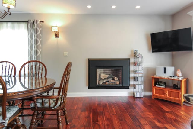 6421 157th St W, Oak Forest, IL 60452 - dining room featuring dark wood-type flooring, recessed lighting, baseboards, and a fireplace