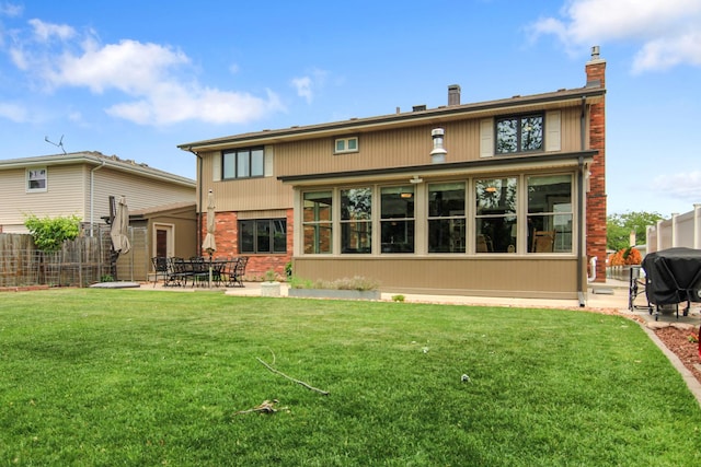 6421 157th St W, Oak Forest, IL 60452 - back of property featuring a chimney, a patio area, and brick siding