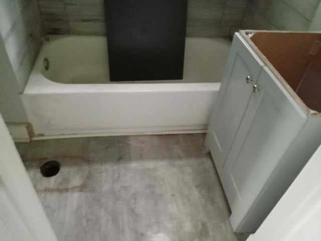 2324 W Wiswall St, Peoria, IL 61605 - full bathroom featuring vanity and a tub to relax in