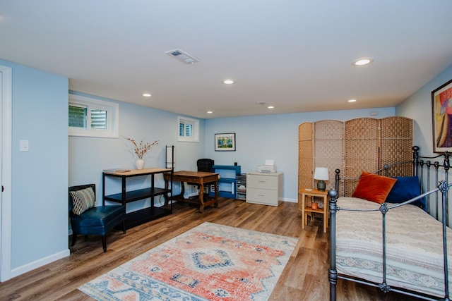 612 S Blvd Unit C, Evanston, IL 60202 - bedroom featuring wood finished floors, recessed lighting, and a desk