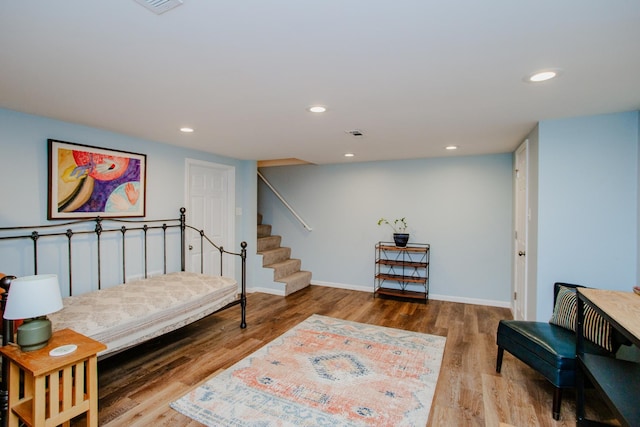 612 S Blvd Unit C, Evanston, IL 60202 - living area featuring wood finished floors, recessed lighting, and stairs