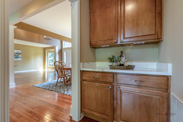 1430 Mcclellan Ct, Lindenhurst, IL 60046 - bar with light wood finished floors and baseboards