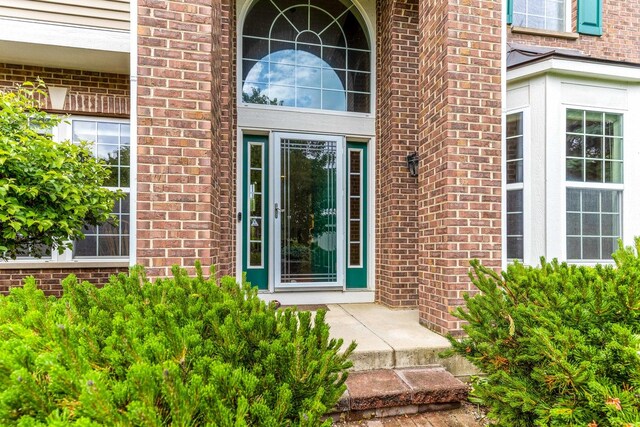 1430 Mcclellan Ct, Lindenhurst, IL 60046 - property entrance with brick siding