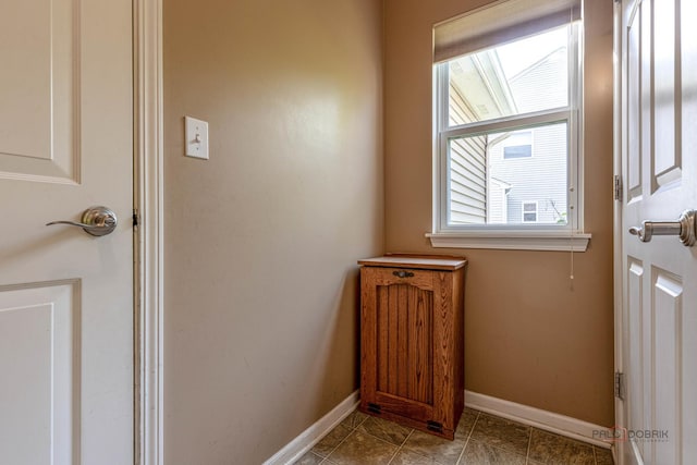 1430 Mcclellan Ct, Lindenhurst, IL 60046 - doorway to outside featuring baseboards and tile patterned floors