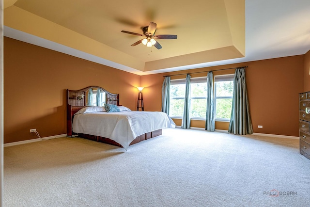 1430 Mcclellan Ct, Lindenhurst, IL 60046 - bedroom featuring a raised ceiling, carpet flooring, baseboards, and ceiling fan