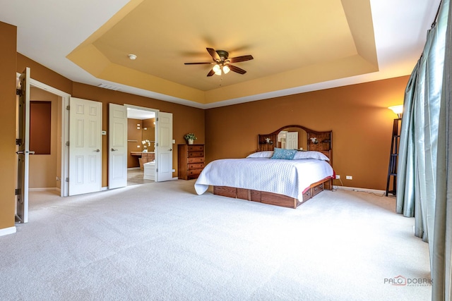 1430 Mcclellan Ct, Lindenhurst, IL 60046 - bedroom with a raised ceiling, light colored carpet, baseboards, and ensuite bathroom