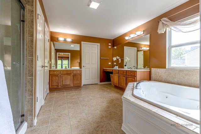 1430 Mcclellan Ct, Lindenhurst, IL 60046 - bathroom with a stall shower, vanity, a jetted tub, tile patterned flooring, and baseboards