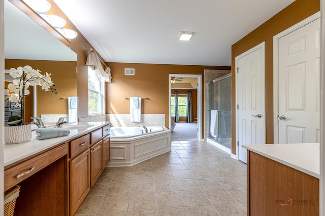 1430 Mcclellan Ct, Lindenhurst, IL 60046 - full bathroom with vanity, tile patterned flooring, a stall shower, a bath, and a ceiling fan