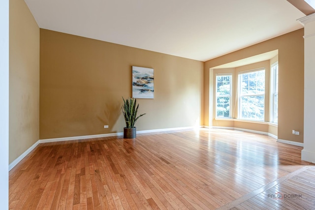1430 Mcclellan Ct, Lindenhurst, IL 60046 - spare room featuring light wood-type flooring and baseboards
