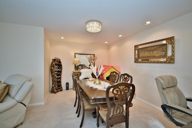 4901 Golf Rd Unit 310, Skokie, IL 60077 - dining area featuring carpet flooring, baseboards, recessed lighting, and a chandelier