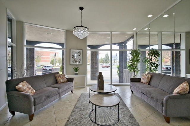 4901 Golf Rd Unit 310, Skokie, IL 60077 - living room featuring a wall of windows, plenty of natural light, a chandelier, recessed lighting, and light tile patterned floors