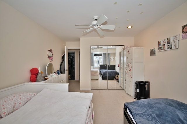 4901 Golf Rd Unit 310, Skokie, IL 60077 - bedroom with light colored carpet, a closet, a ceiling fan, and recessed lighting