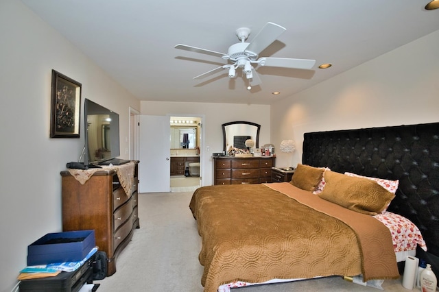 4901 Golf Rd Unit 310, Skokie, IL 60077 - bedroom with light colored carpet, connected bathroom, recessed lighting, and a ceiling fan