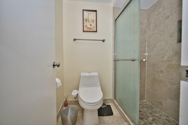 4901 Golf Rd Unit 310, Skokie, IL 60077 - bathroom with toilet, a stall shower, and baseboards