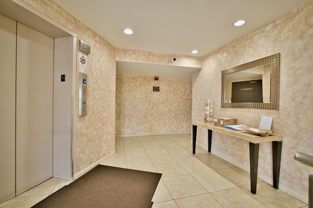 4901 Golf Rd Unit 310, Skokie, IL 60077 - corridor with elevator, tile patterned floors, recessed lighting, and baseboards