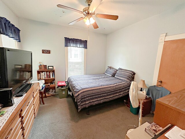 117 W 9th St, Streator, IL 61364 - carpeted bedroom featuring ceiling fan