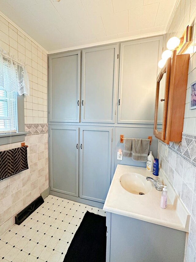 117 W 9th St, Streator, IL 61364 - bathroom with tile walls and vanity