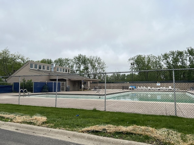 412 Bluebird Ln Unit 412, Deerfield, IL 60015 - view of swimming pool with a tennis court