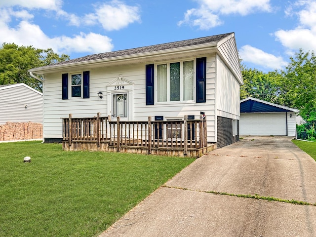 2519 Apache Ave, Sauk Village, IL 60411 - bi-level home featuring an outbuilding, a garage, and a front lawn