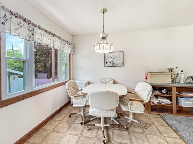 2519 Apache Ave, Sauk Village, IL 60411 - dining area featuring baseboards, tile patterned floors, and an office area