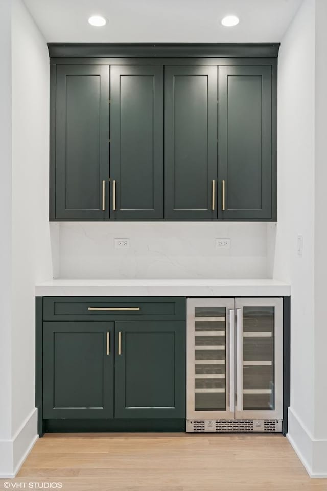 2118 N Sheffield Ave Unit 1, Chicago, IL 60614 - bar area with wine cooler, light wood-style floors, and recessed lighting