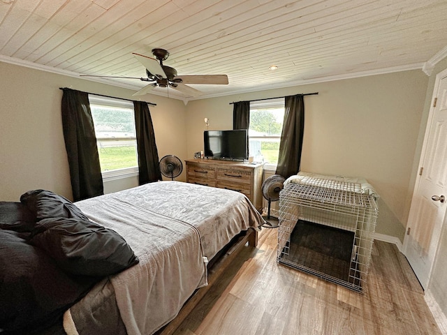 1003 Bazore St, Streator, IL 61364 - bedroom featuring multiple windows, wood finished floors, ornamental molding, a ceiling fan, and wooden ceiling