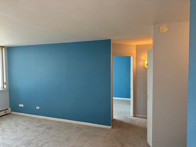 20 N Tower Rd Unit 6J, Oak Brook, IL 60523 - spare room featuring carpet flooring, a smoke detector, and baseboards