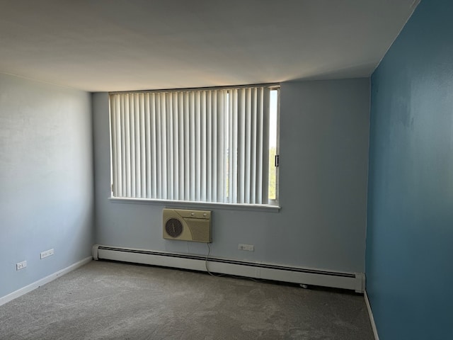 20 N Tower Rd Unit 6J, Oak Brook, IL 60523 - carpeted empty room featuring baseboard heating, plenty of natural light, and baseboards