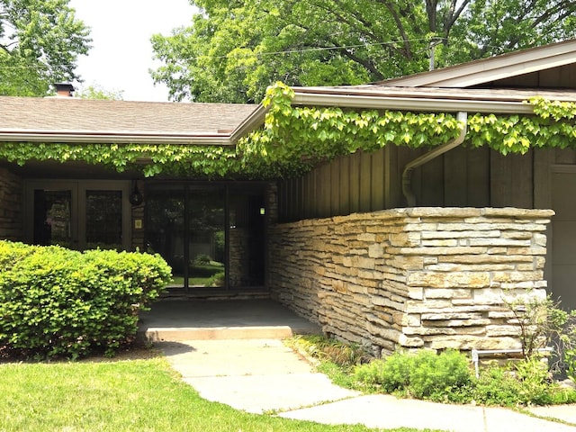 1720 Stratford Ln, Rockford, IL 61107 - view of exterior entry featuring stone siding and french doors