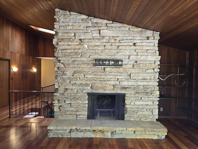 1720 Stratford Ln, Rockford, IL 61107 - detailed view of wooden walls, wood ceiling, wood finished floors, and a fireplace