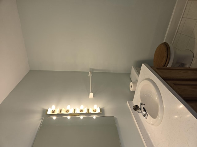 1720 Stratford Ln, Rockford, IL 61107 - bathroom with toilet and a sink