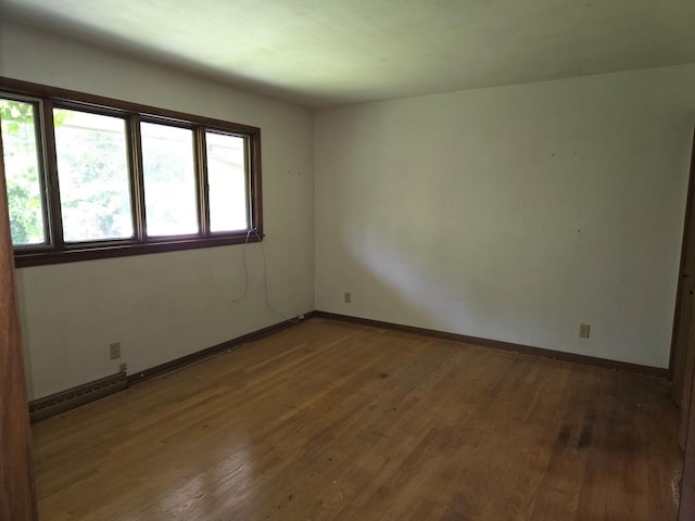 1720 Stratford Ln, Rockford, IL 61107 - unfurnished room with wood finished floors and baseboards