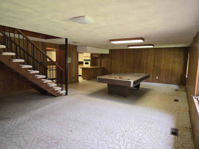 1720 Stratford Ln, Rockford, IL 61107 - playroom featuring wooden walls, light floors, and billiards table