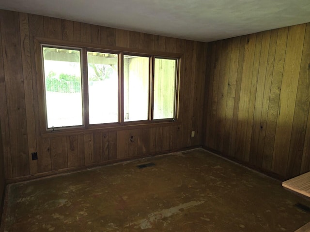 1720 Stratford Ln, Rockford, IL 61107 - spare room featuring wood walls