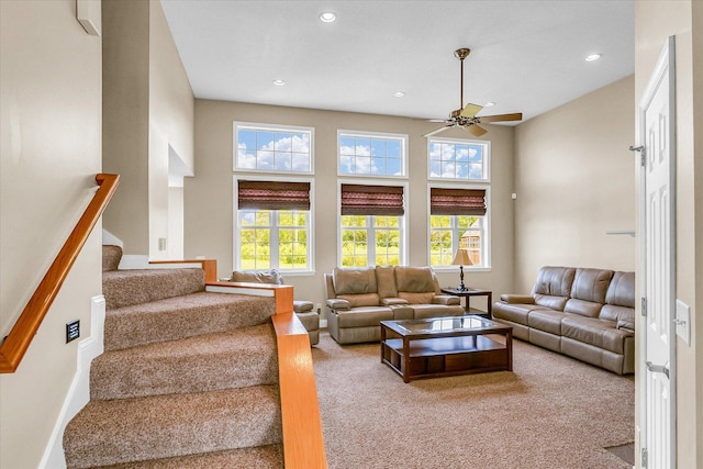 402 Cypress Ct, Saint Joseph, IL 61873 - carpeted living area with ceiling fan, recessed lighting, and stairway
