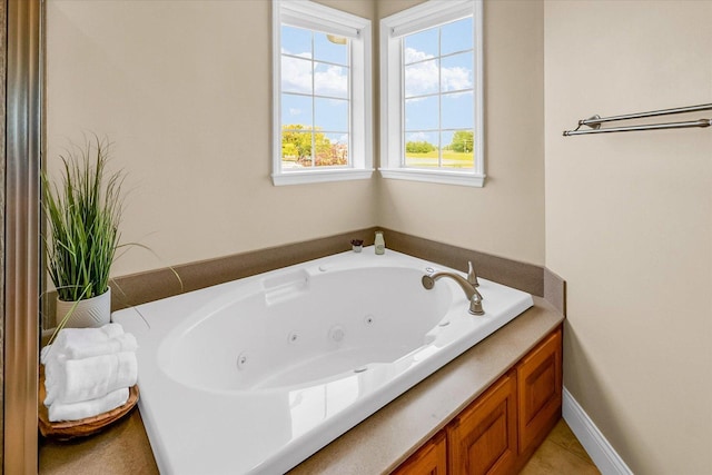 402 Cypress Ct, Saint Joseph, IL 61873 - bathroom with a tub with jets