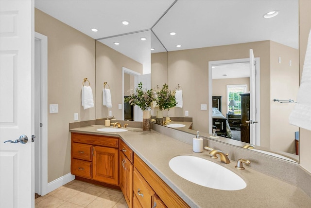 402 Cypress Ct, Saint Joseph, IL 61873 - full bathroom with double vanity, tile patterned flooring, connected bathroom, recessed lighting, and baseboards