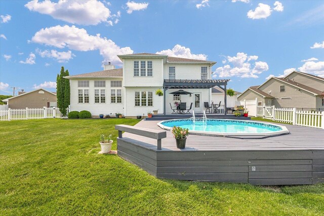 402 Cypress Ct, Saint Joseph, IL 61873 - back of property with a wooden deck and a pergola